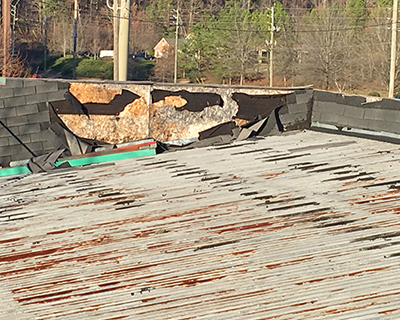 storm damaged shingle roofing in Birmingham
